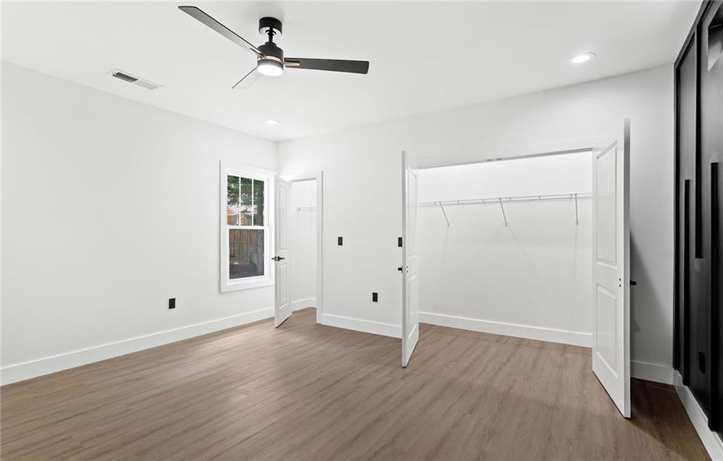 525 Medlock Road Decatur, GA 30030 - Photo 21 of 50 wooden floor in an empty room with a window