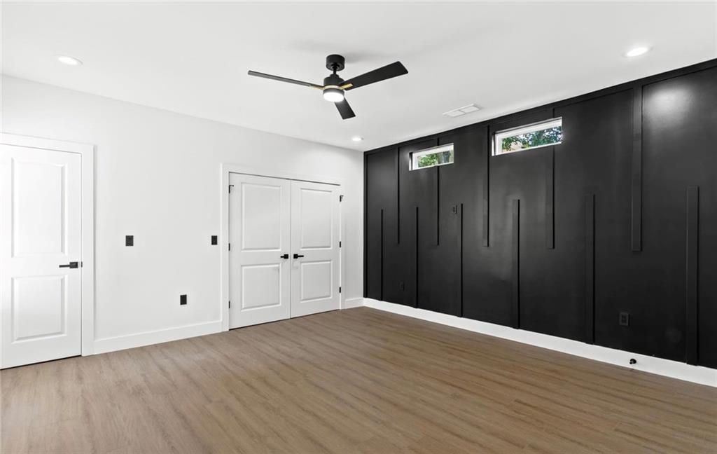 525 Medlock Road Decatur, GA 30030 - Photo 22 of 50 a view of an empty room with wooden floor