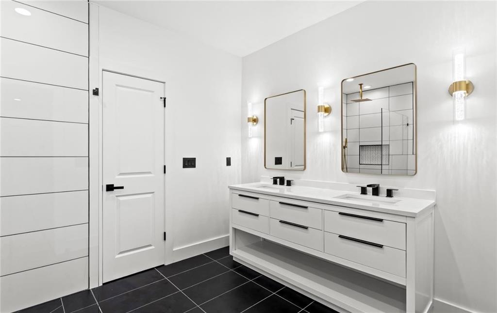 525 Medlock Road Decatur, GA 30030 - Photo 23 of 50 a bathroom with a double vanity sink mirror and double