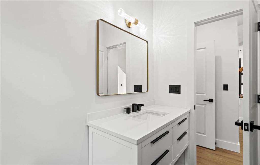 525 Medlock Road Decatur, GA 30030 - Photo 31 of 50 a bathroom with a sink vanity and a mirror