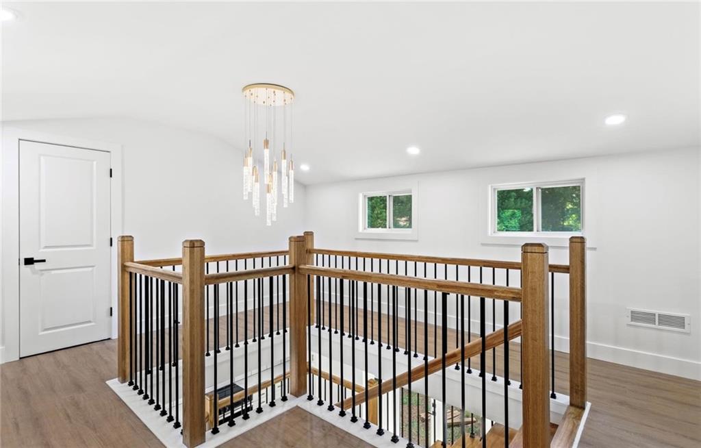 525 Medlock Road Decatur, GA 30030 - Photo 36 of 50 a view of hallway with chandelier