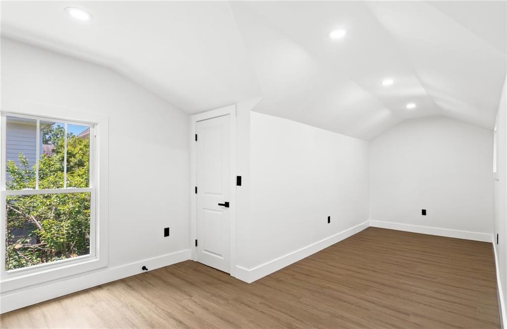 525 Medlock Road Decatur, GA 30030 - Photo 38 of 50 a view of room with window and hardwood floor