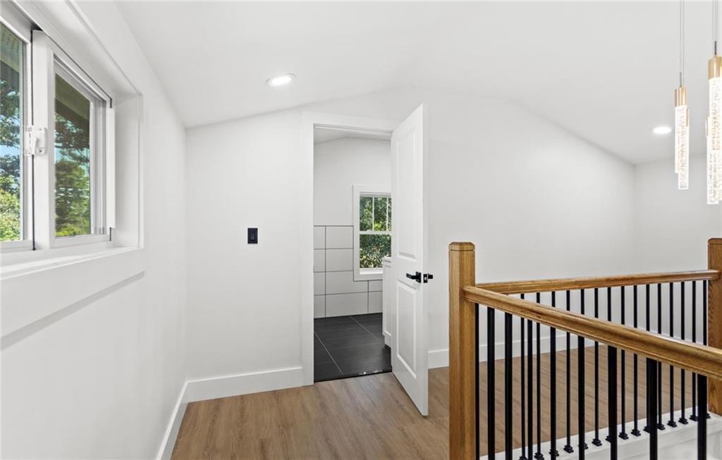 525 Medlock Road Decatur, GA 30030 - Photo 39 of 50 a view of a hallway with wooden floor and entryway