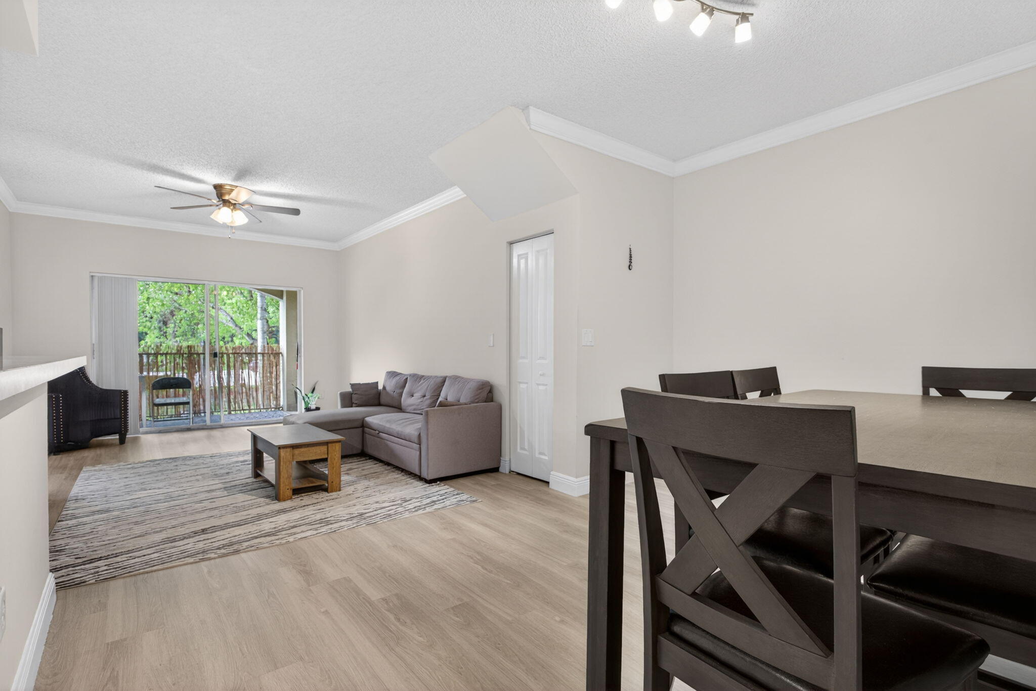 5880 West Sample Road, Unit 206 Coral Springs, FL 33067 - Photo 8 of 37 a living room with furniture