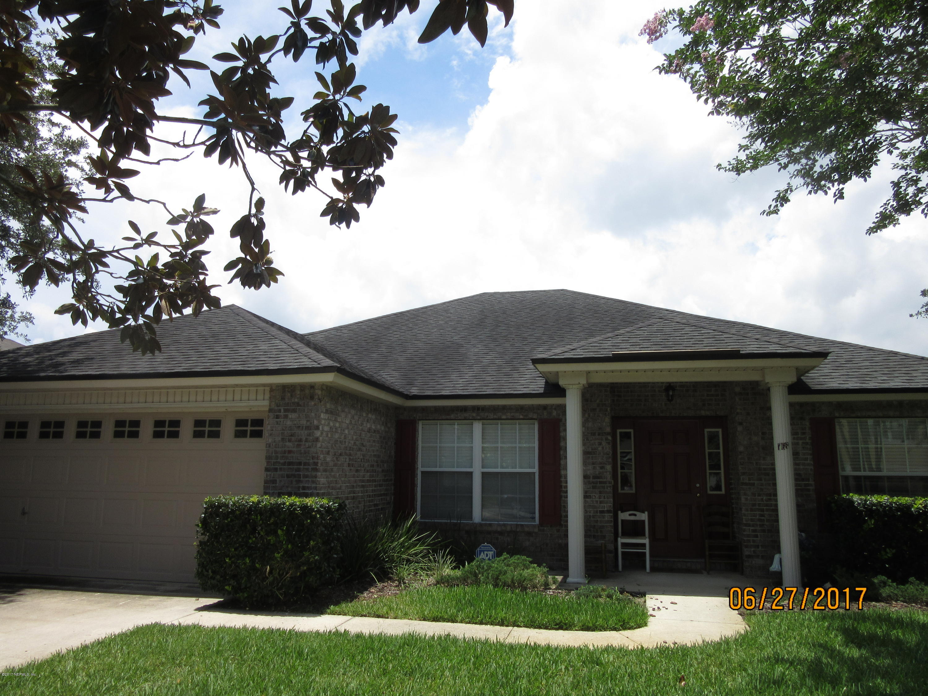 766 East Red House Branch Road St. Augustine, FL 32084 - Photo 1 of 15 a view of a house with a yard