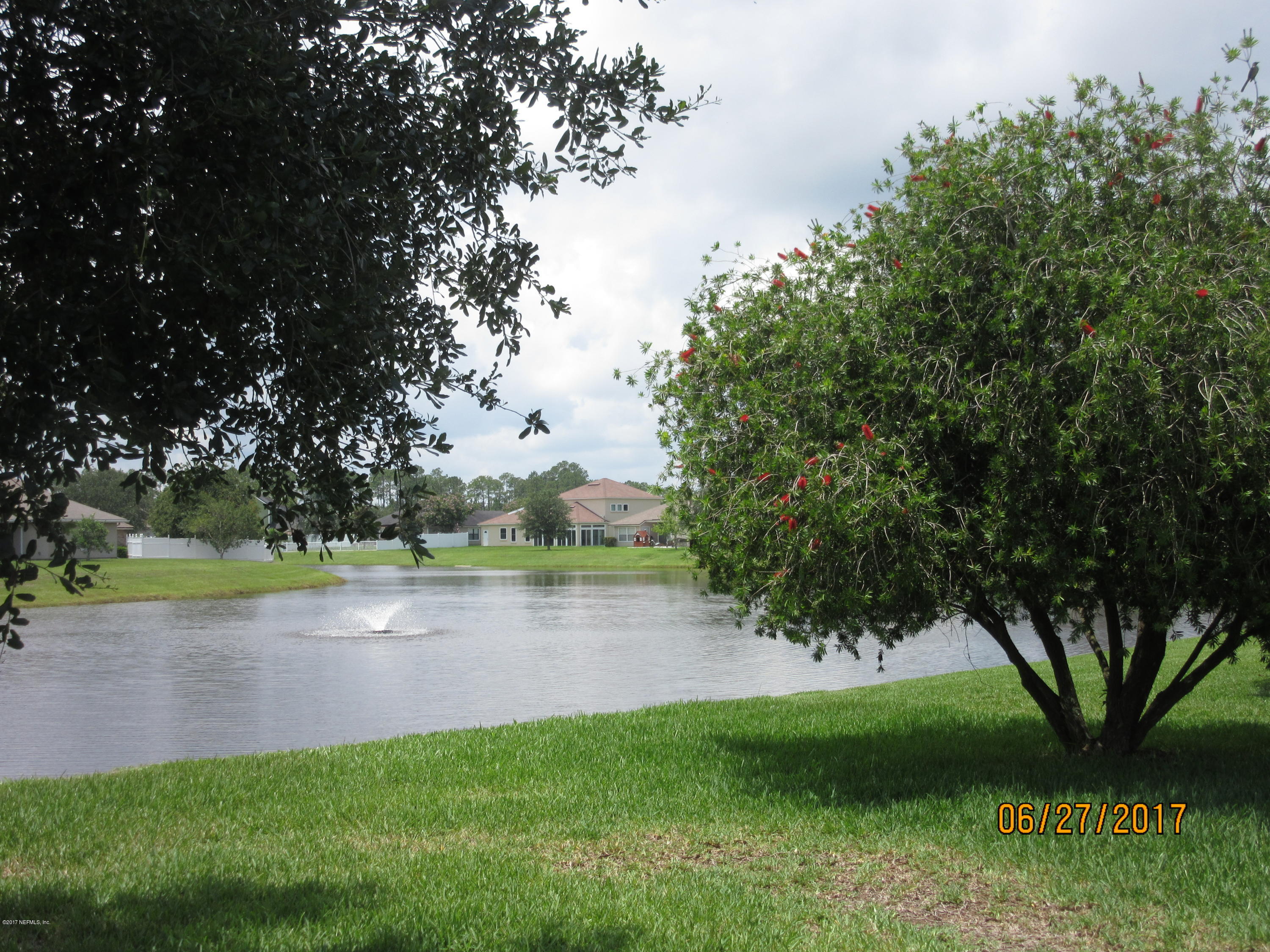 766 East Red House Branch Road St. Augustine, FL 32084 - Photo 4 of 15 a view of a lake with houses