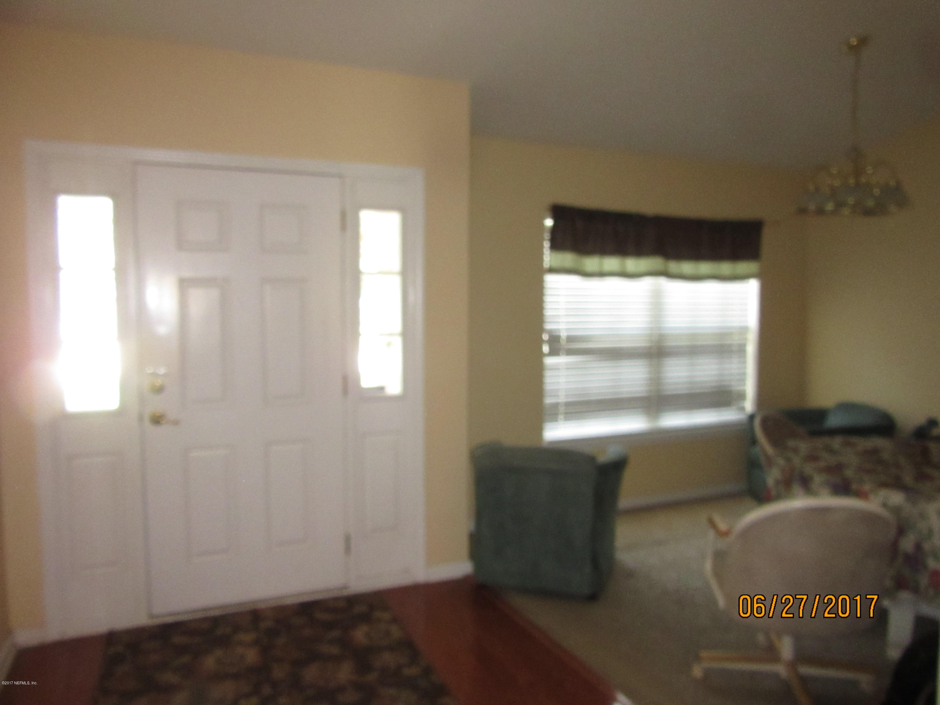 766 East Red House Branch Road St. Augustine, FL 32084 - Photo 6 of 15 a view of an empty room and window