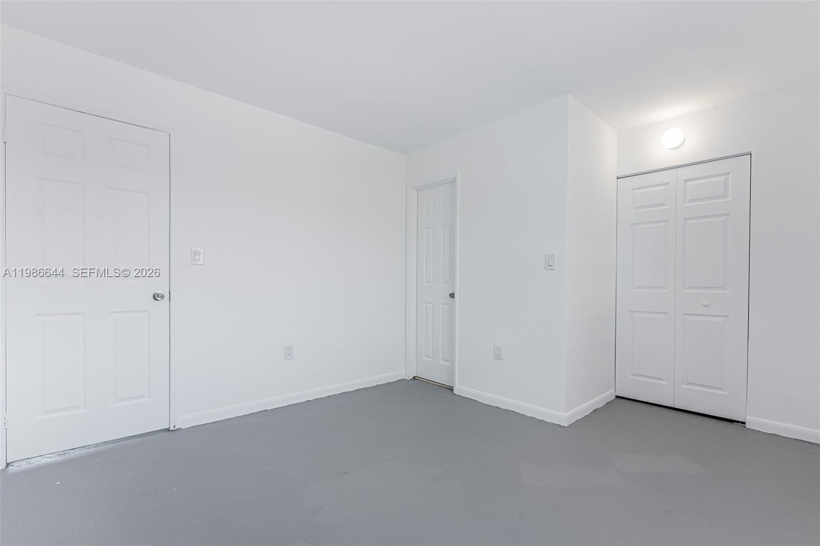 15260 Southwest 80th Street, Unit 10 Miami, FL 33193 - Photo 19 of 27 a view of an empty room