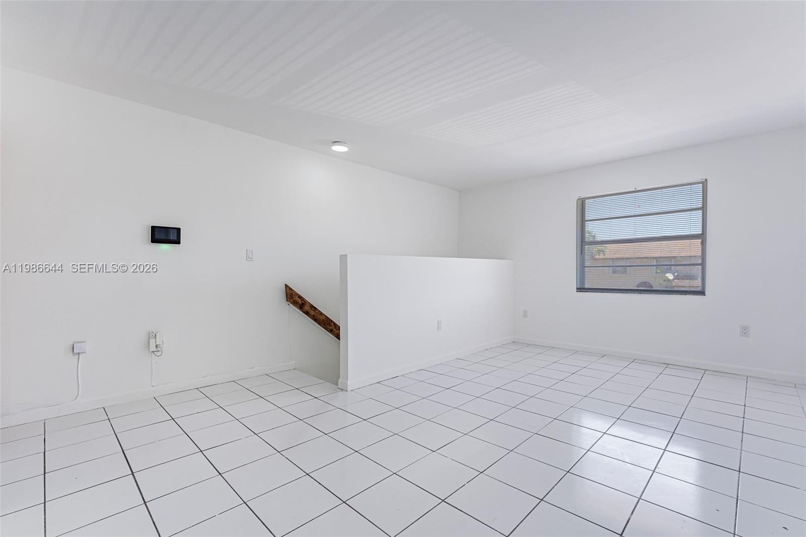 15260 Southwest 80th Street, Unit 10 Miami, FL 33193 - Photo 5 of 27 a view of an empty room