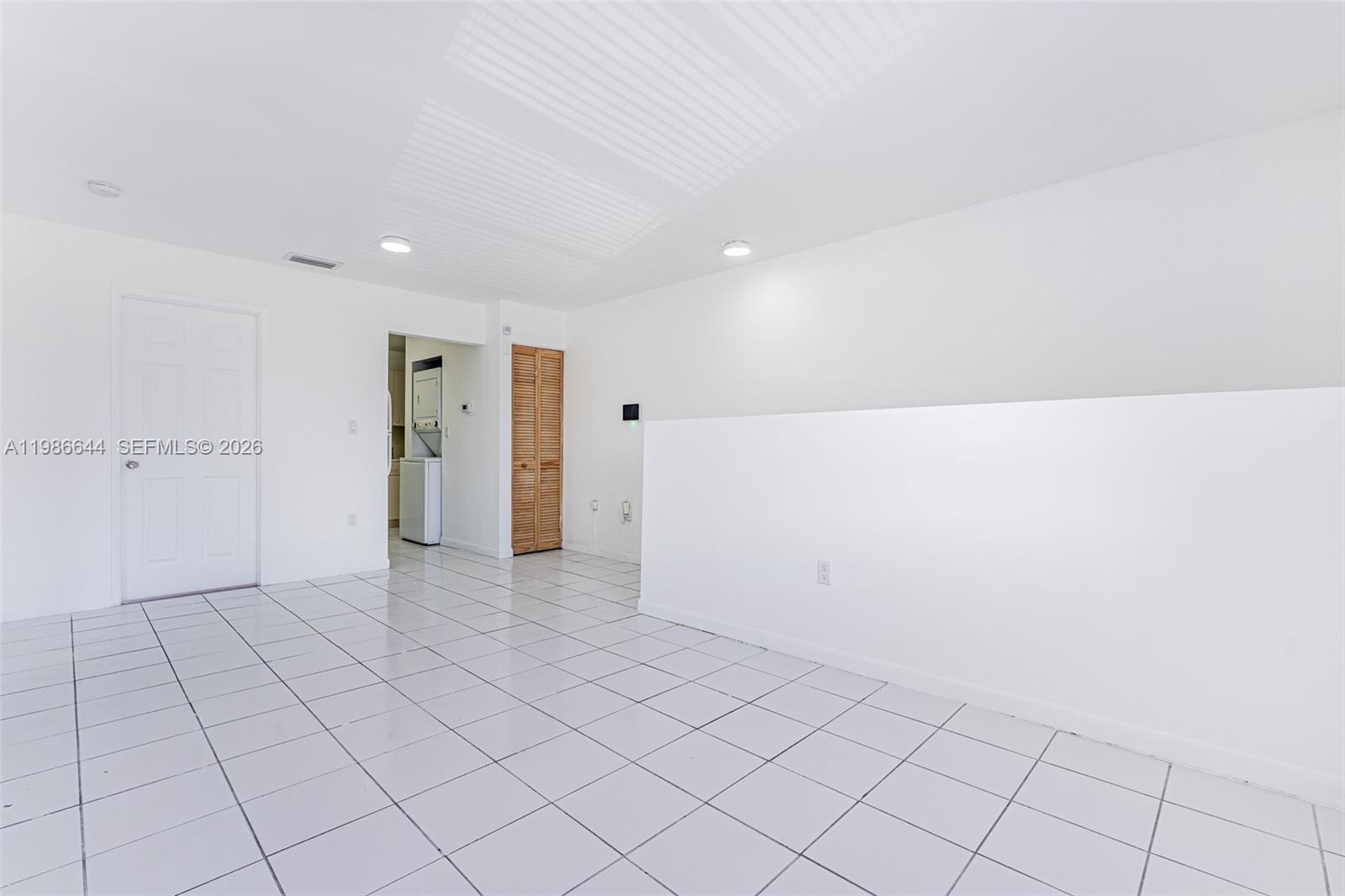 15260 Southwest 80th Street, Unit 10 Miami, FL 33193 - Photo 6 of 27 a view of an empty room