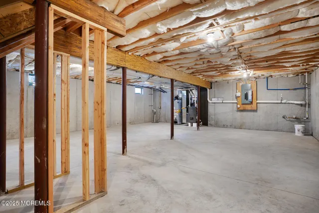 a view of staircase with white walls