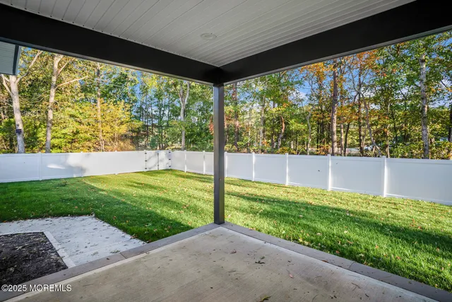 a view of a porch with a yard