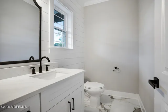 a view of a kitchen with a sink and a dishwasher