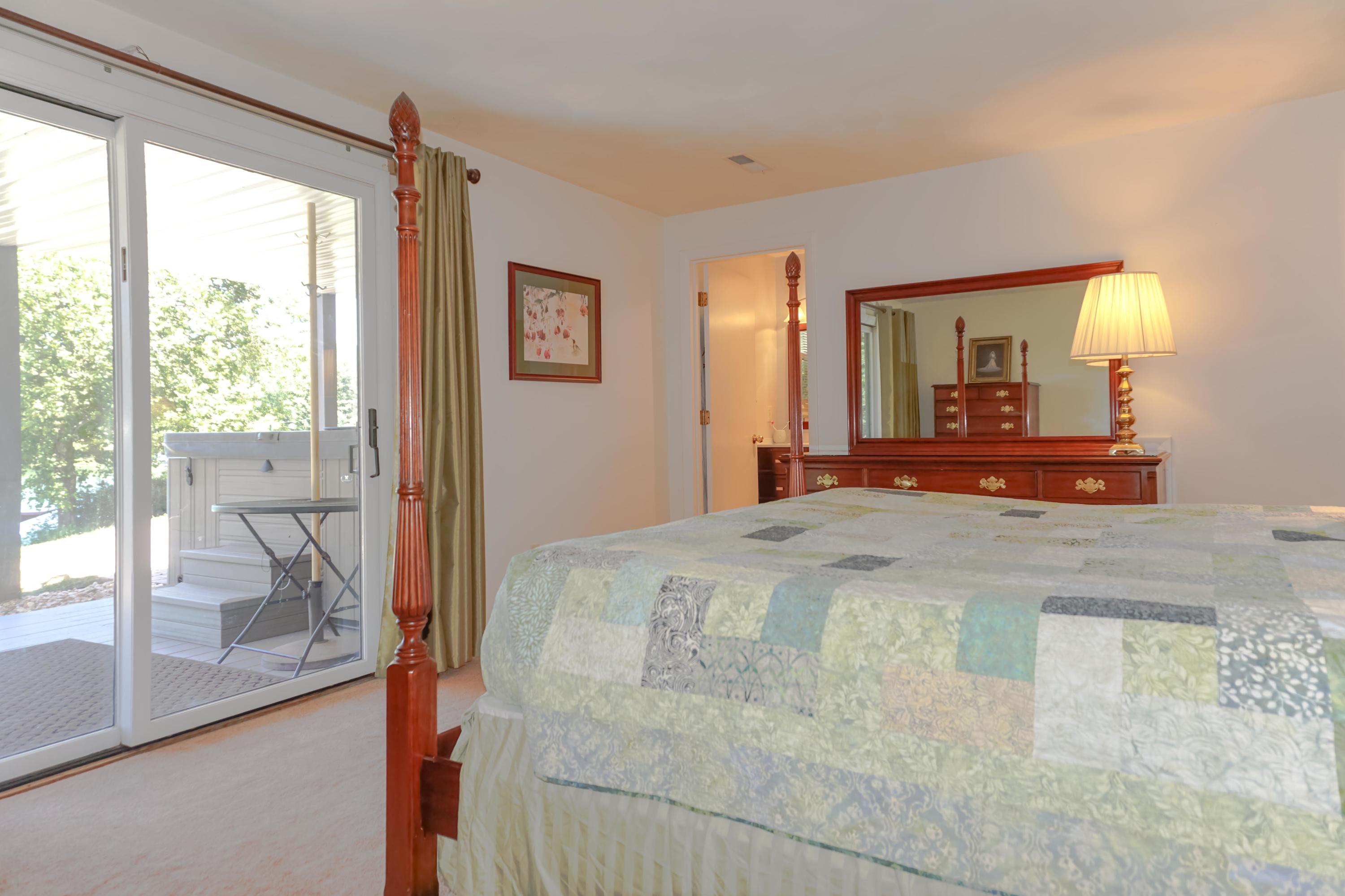 497 Cedar Ridge Road Union Hall, VA 24176 - Photo 20 of 31 a bedroom with a bed and a large window