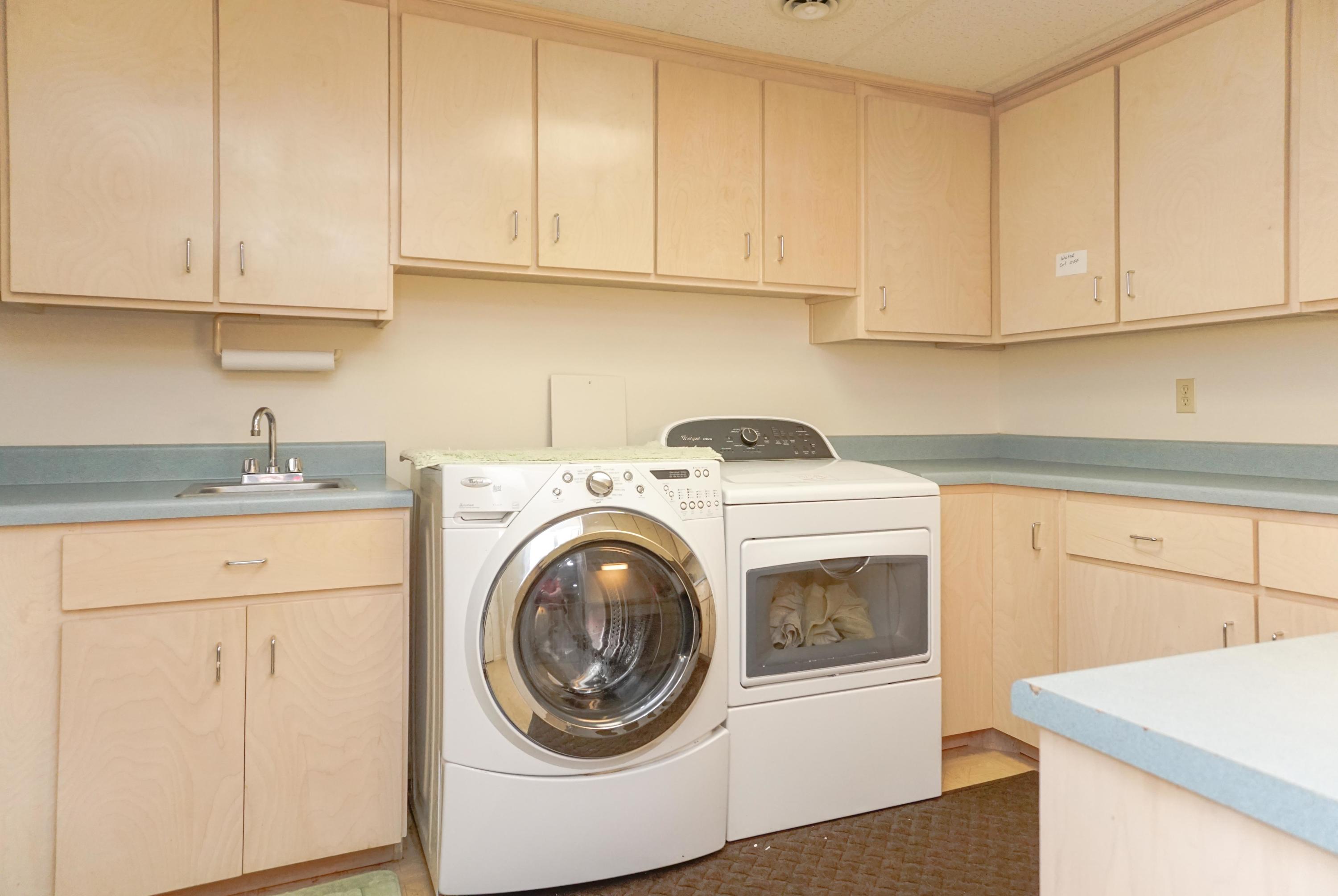 497 Cedar Ridge Road Union Hall, VA 24176 - Photo 22 of 31 a utility room with sink dryer and washer