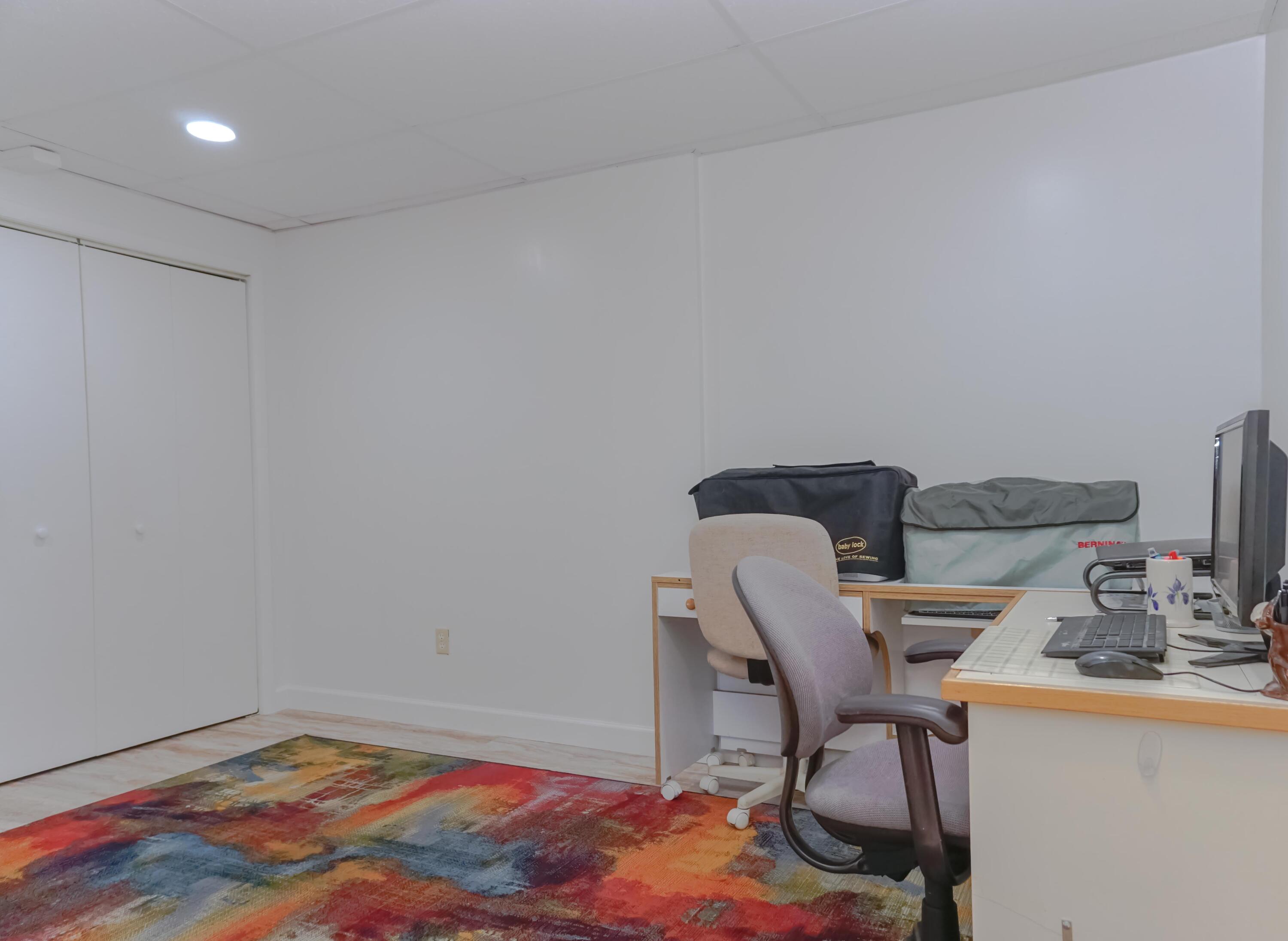 497 Cedar Ridge Road Union Hall, VA 24176 - Photo 23 of 31 a workspace with furniture and wooden floor