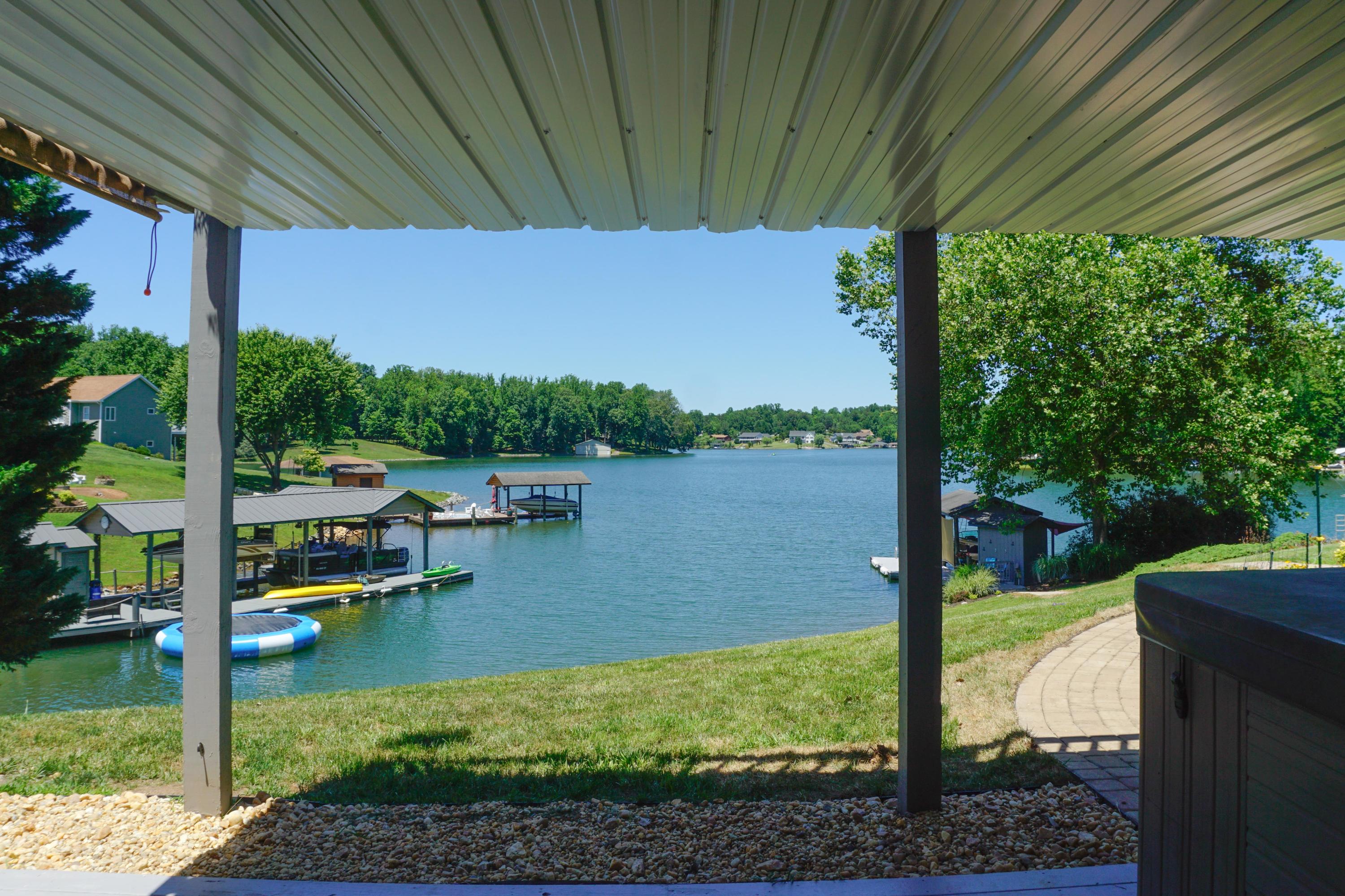 497 Cedar Ridge Road Union Hall, VA 24176 - Photo 25 of 31 a view of a lake with a big yard