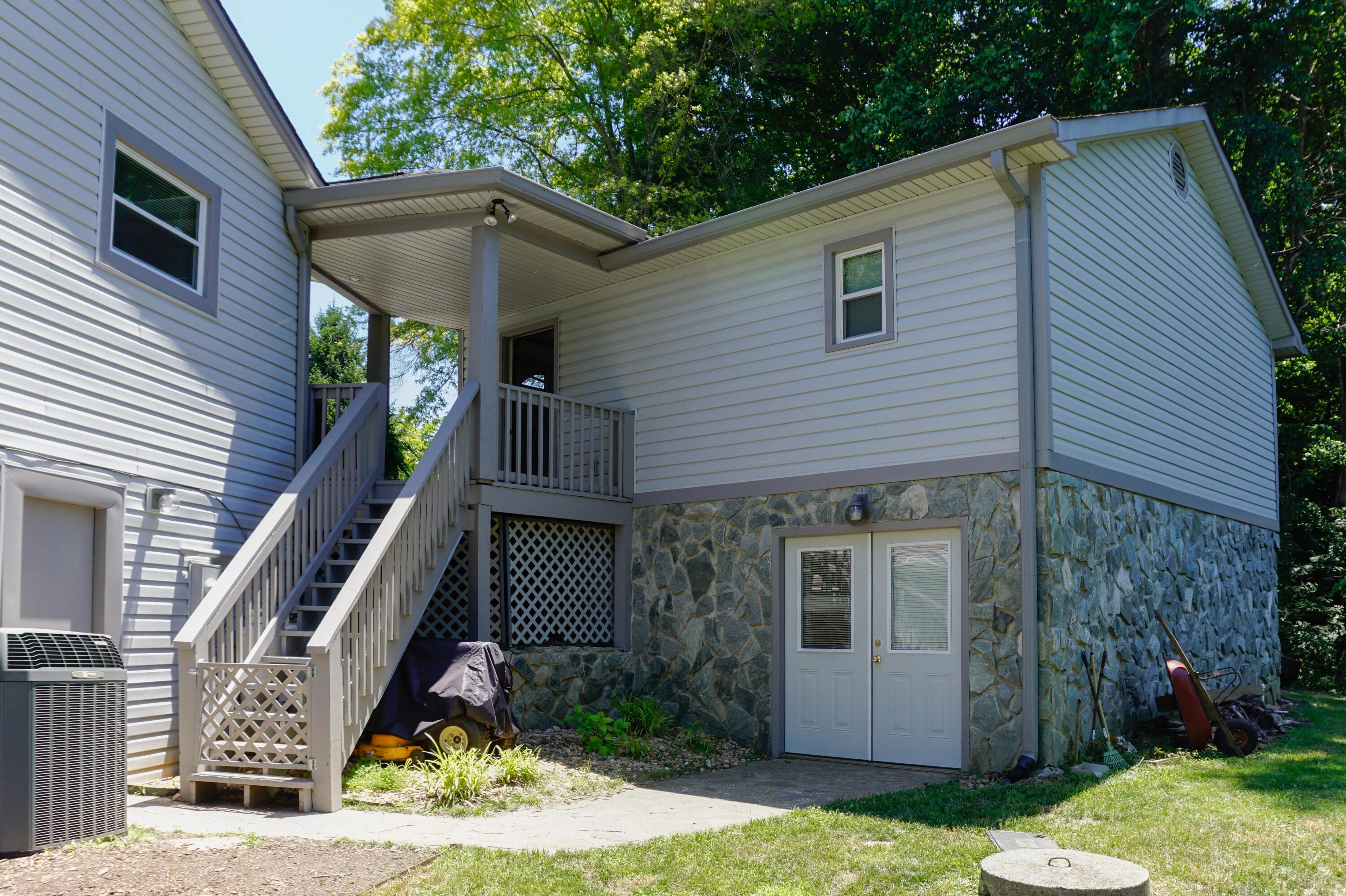 497 Cedar Ridge Road Union Hall, VA 24176 - Photo 27 of 31 a front view of a house with a yard