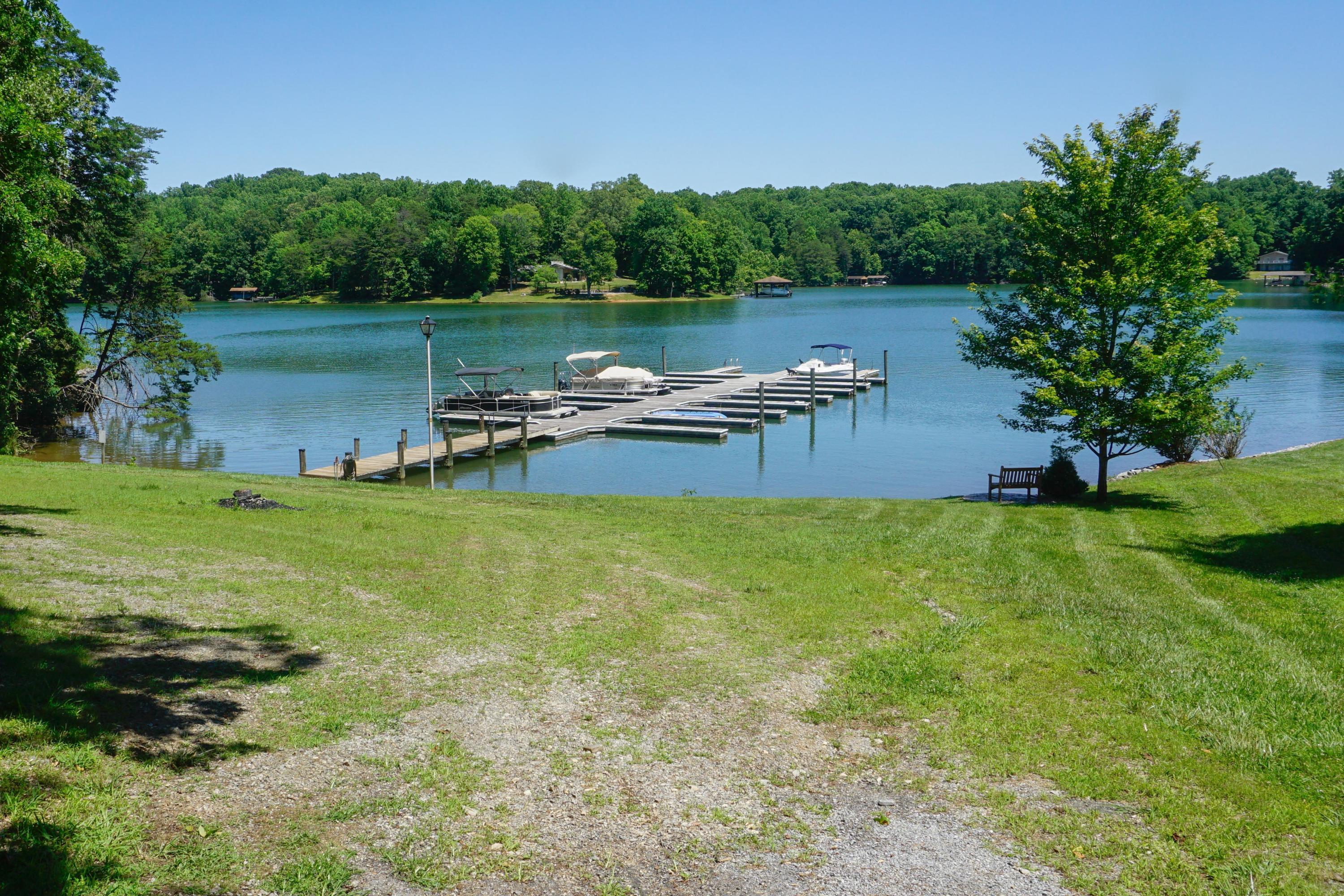 497 Cedar Ridge Road Union Hall, VA 24176 - Photo 29 of 31 a view of a lake with houses in the back