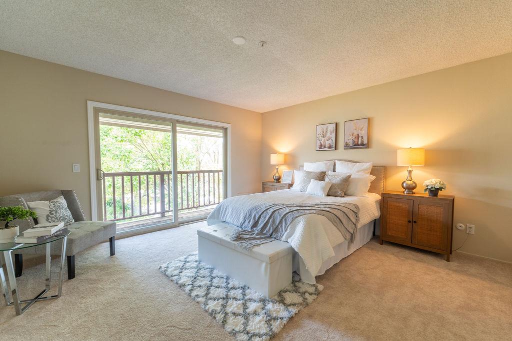 1005 Golf Course Drive Rohnert Park, CA 94928 - Photo 11 of 44 a spacious bedroom with a bed and a window