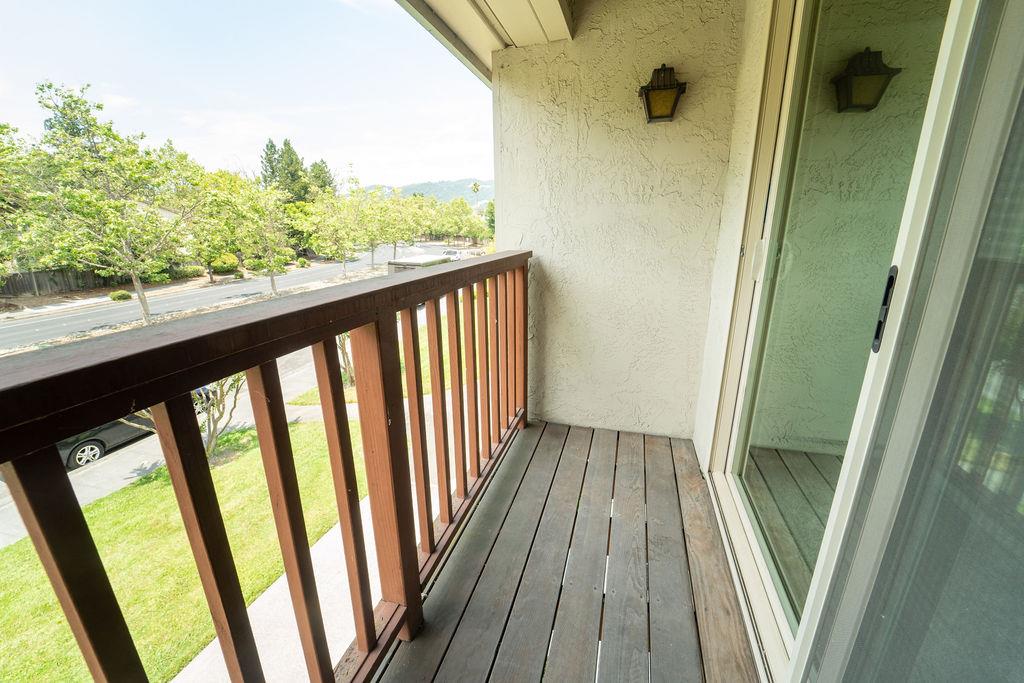 1005 Golf Course Drive Rohnert Park, CA 94928 - Photo 16 of 44 a view of a balcony with wooden floor