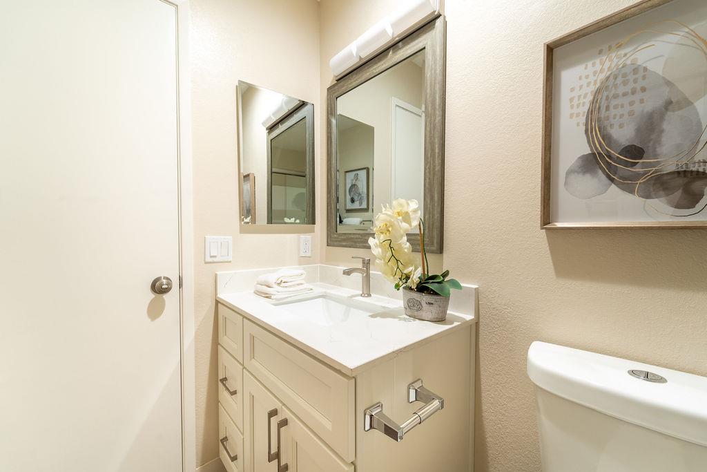 1005 Golf Course Drive Rohnert Park, CA 94928 - Photo 18 of 44 a bathroom with a sink and a mirror
