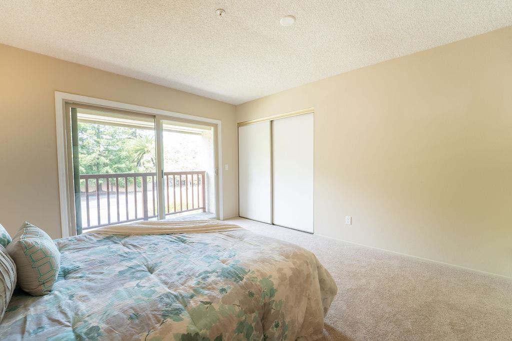 1005 Golf Course Drive Rohnert Park, CA 94928 - Photo 23 of 44 a view of a bedroom with a bed and a window