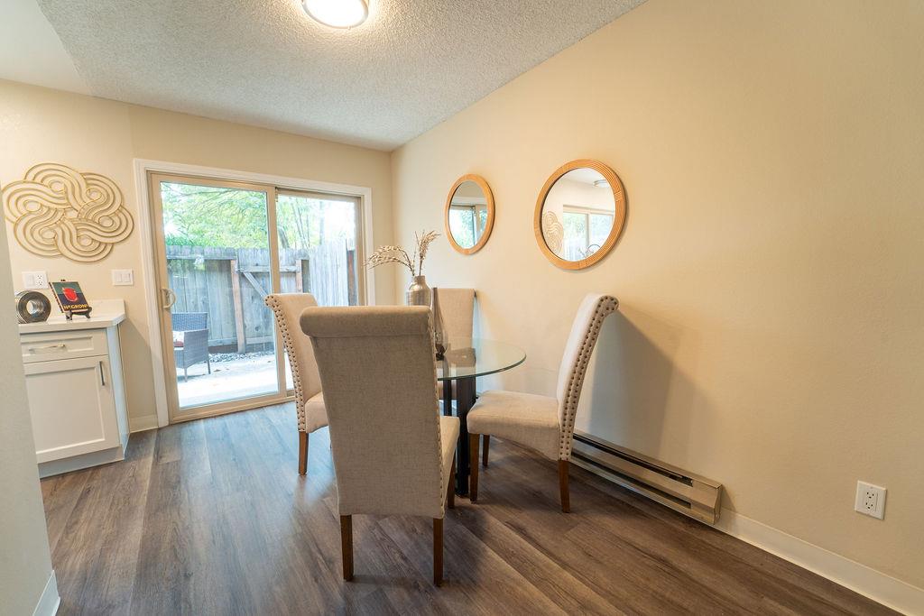 1005 Golf Course Drive Rohnert Park, CA 94928 - Photo 7 of 44 a view of a dining room with furniture and a window