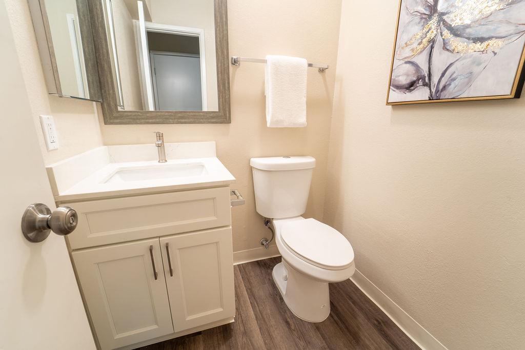1005 Golf Course Drive Rohnert Park, CA 94928 - Photo 9 of 44 a bathroom with a toilet sink and mirror