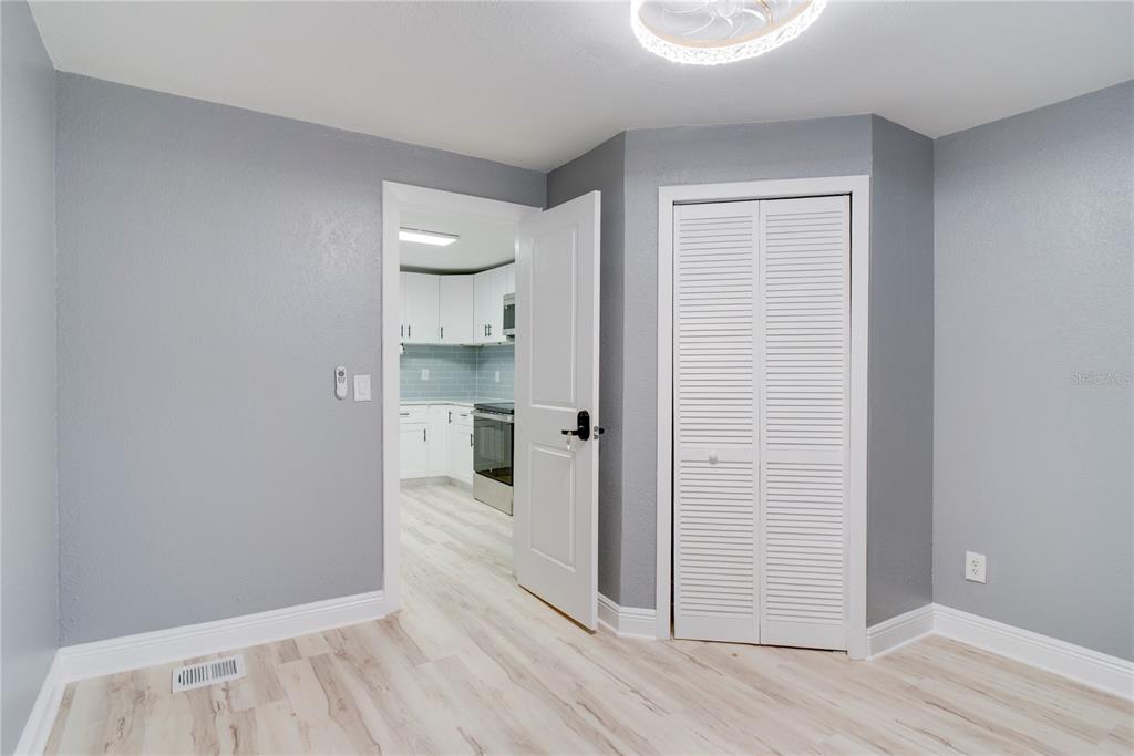 330 East Story Road Winter Garden, FL 34787 - Photo 12 of 21 a view of a kitchen with wooden floor and a sink