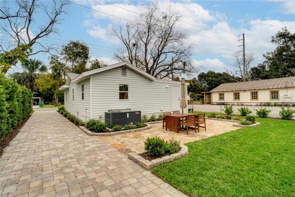 330 East Story Road Winter Garden, FL 34787 - Photo 17 of 21 a view of backyard of house with outdoor seating and green space