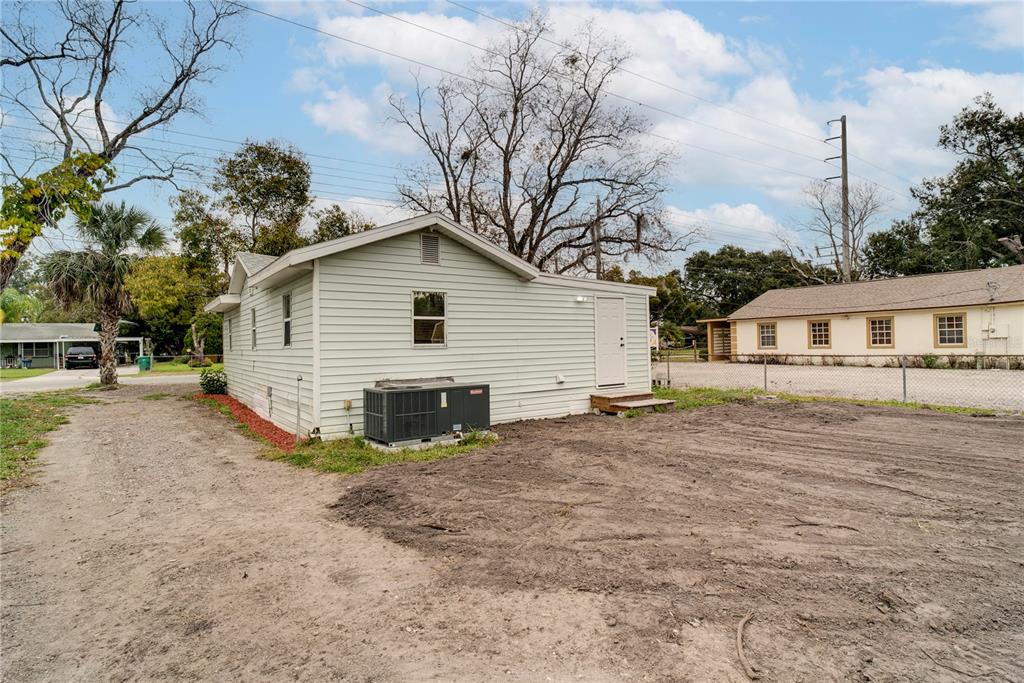 330 East Story Road Winter Garden, FL 34787 - Photo 18 of 21 a view of a house with a yard
