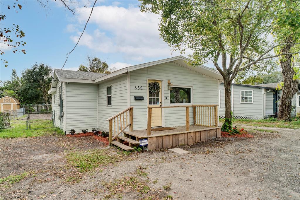 330 East Story Road Winter Garden, FL 34787 - Photo 21 of 21 a view of a house with a yard