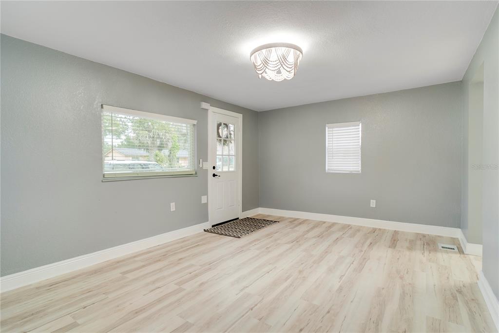 330 East Story Road Winter Garden, FL 34787 - Photo 4 of 21 a view of an empty room with a window