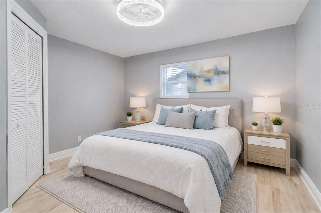 330 East Story Road Winter Garden, FL 34787 - Photo 10 of 21 a bedroom with a bed and a window