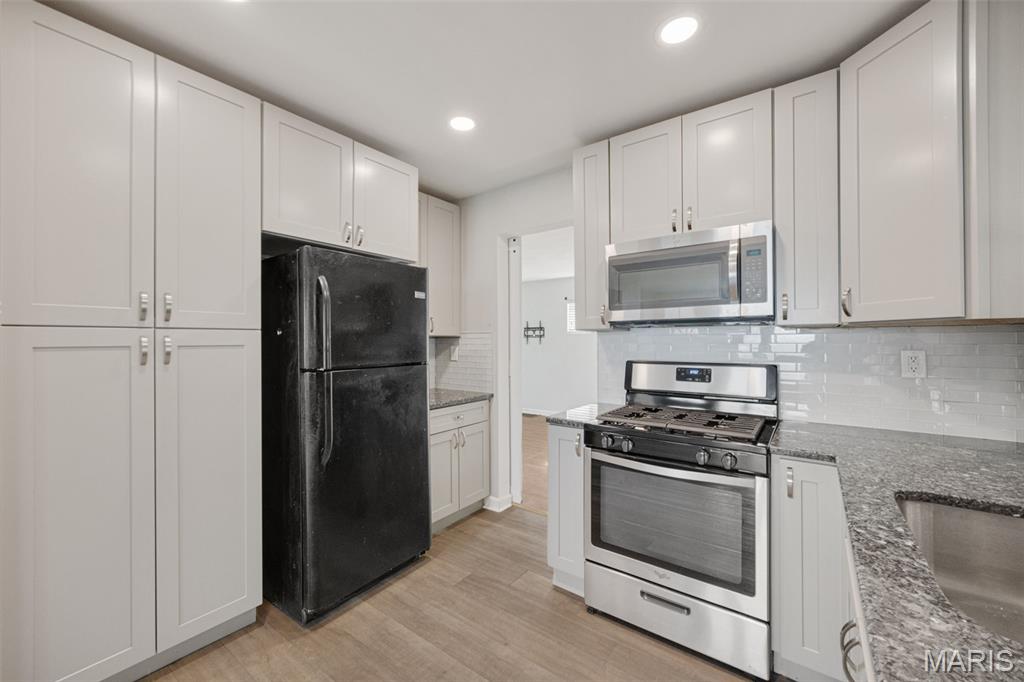 6962 Sutherland Avenue St. Louis, MO 63109 - Photo 11 of 34