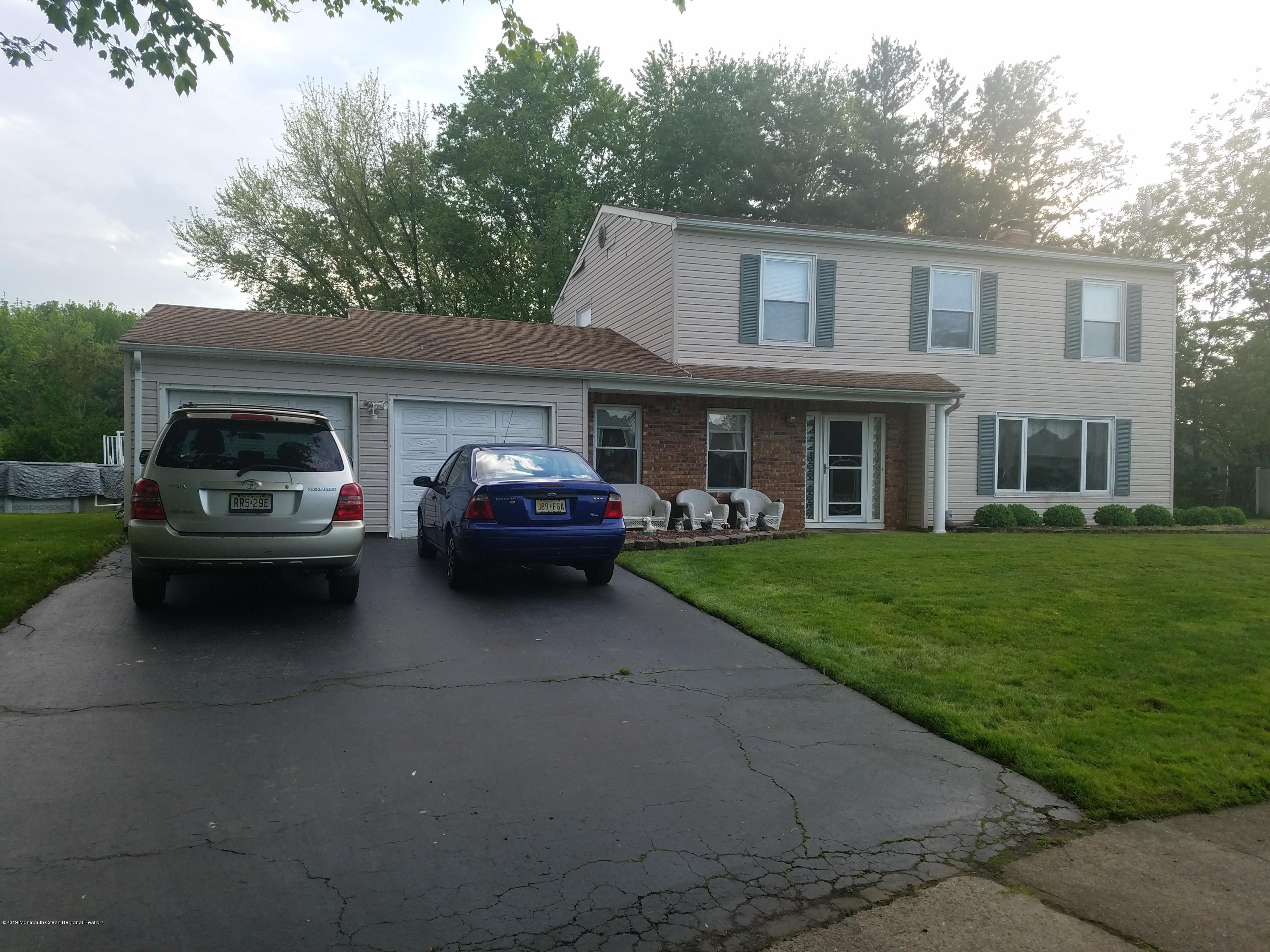 30 Rothbard Road Hazlet, NJ 07730 - Photo 1 of 20 a house view with a garden space