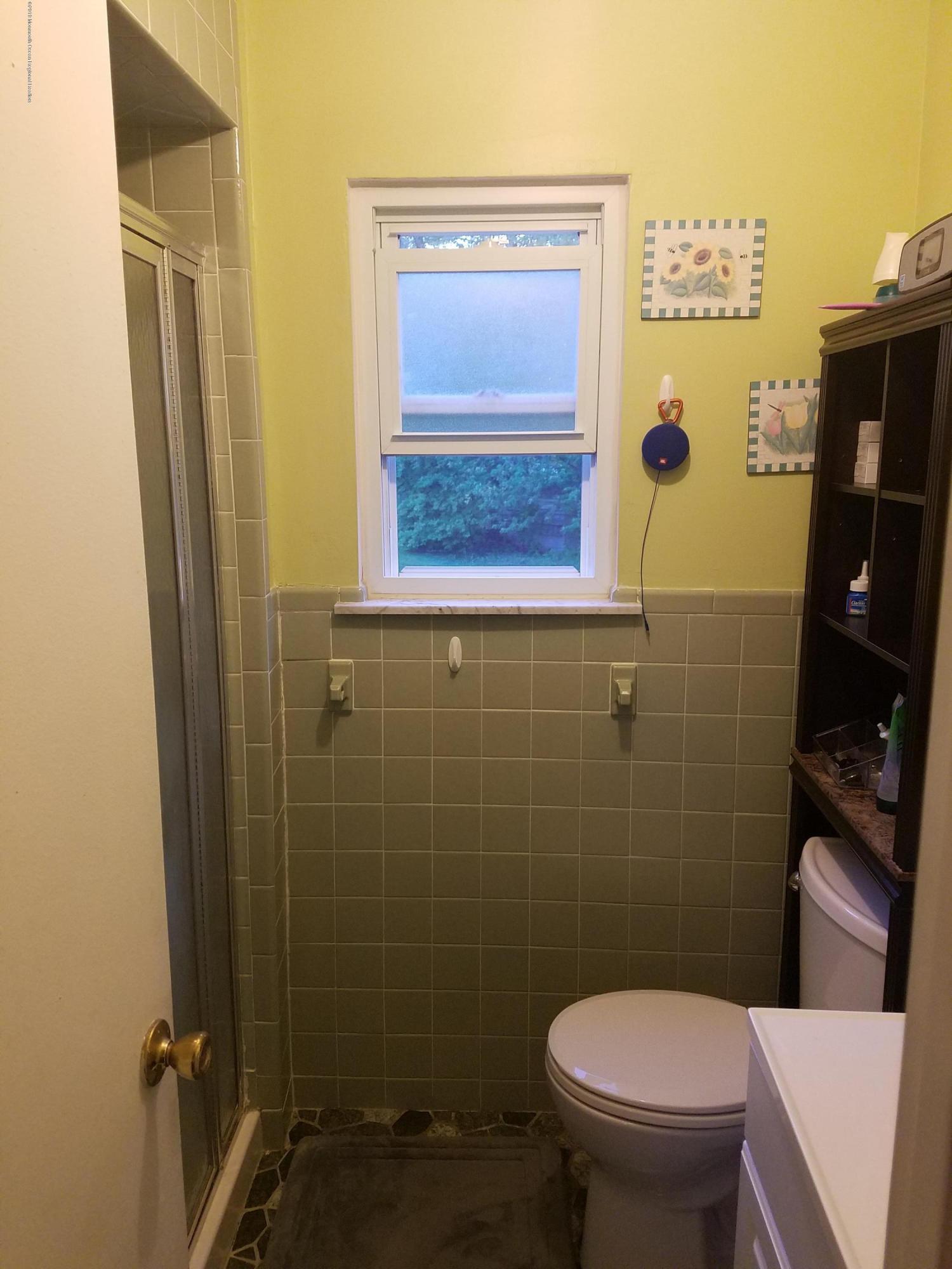 30 Rothbard Road Hazlet, NJ 07730 - Photo 16 of 20 a bathroom with a toilet and a shower