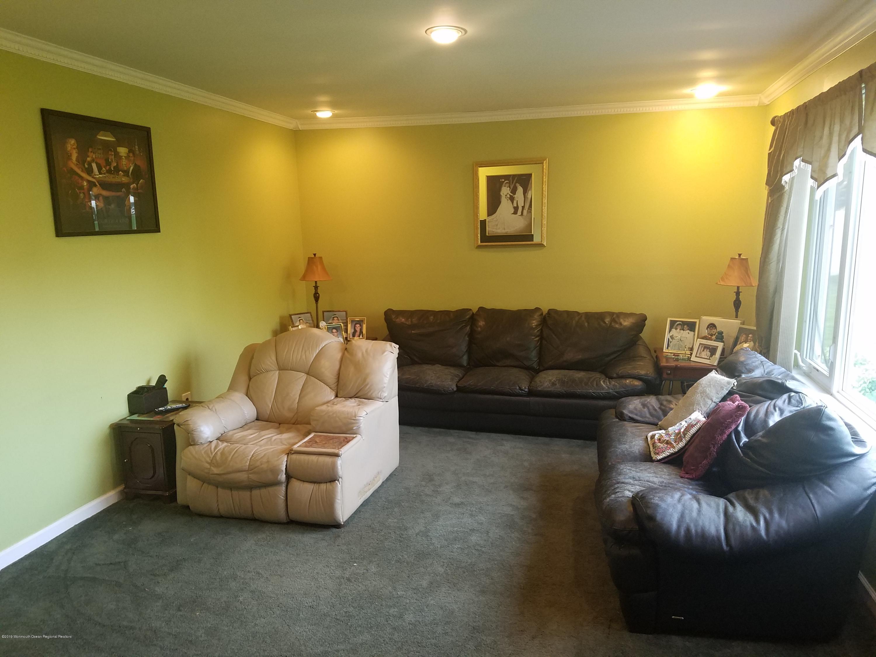 30 Rothbard Road Hazlet, NJ 07730 - Photo 7 of 20 a living room with furniture and a couch