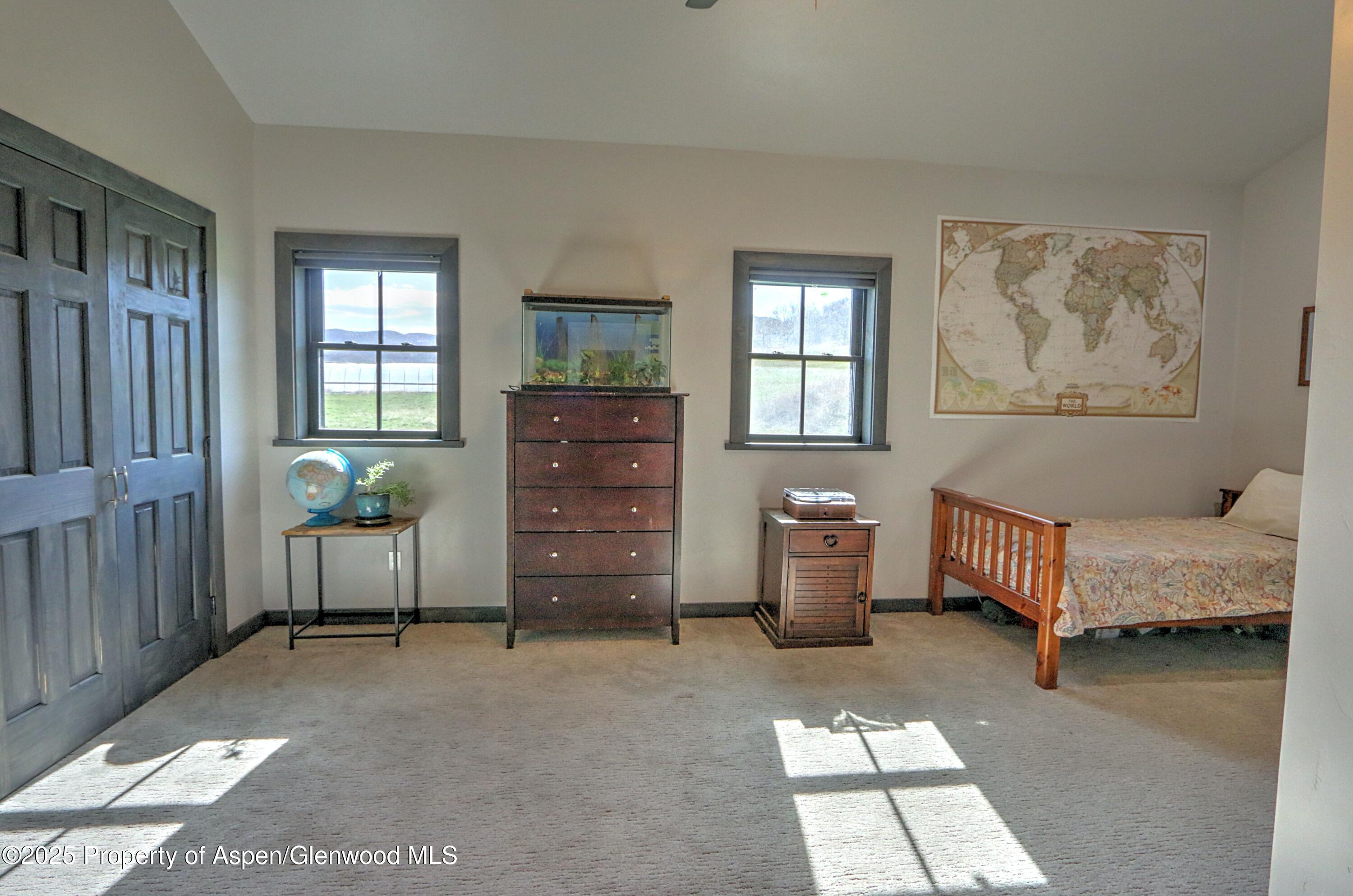 7315 County Road 312 New Castle, CO 81647 - Photo 25 of 75 a living room with furniture and a window