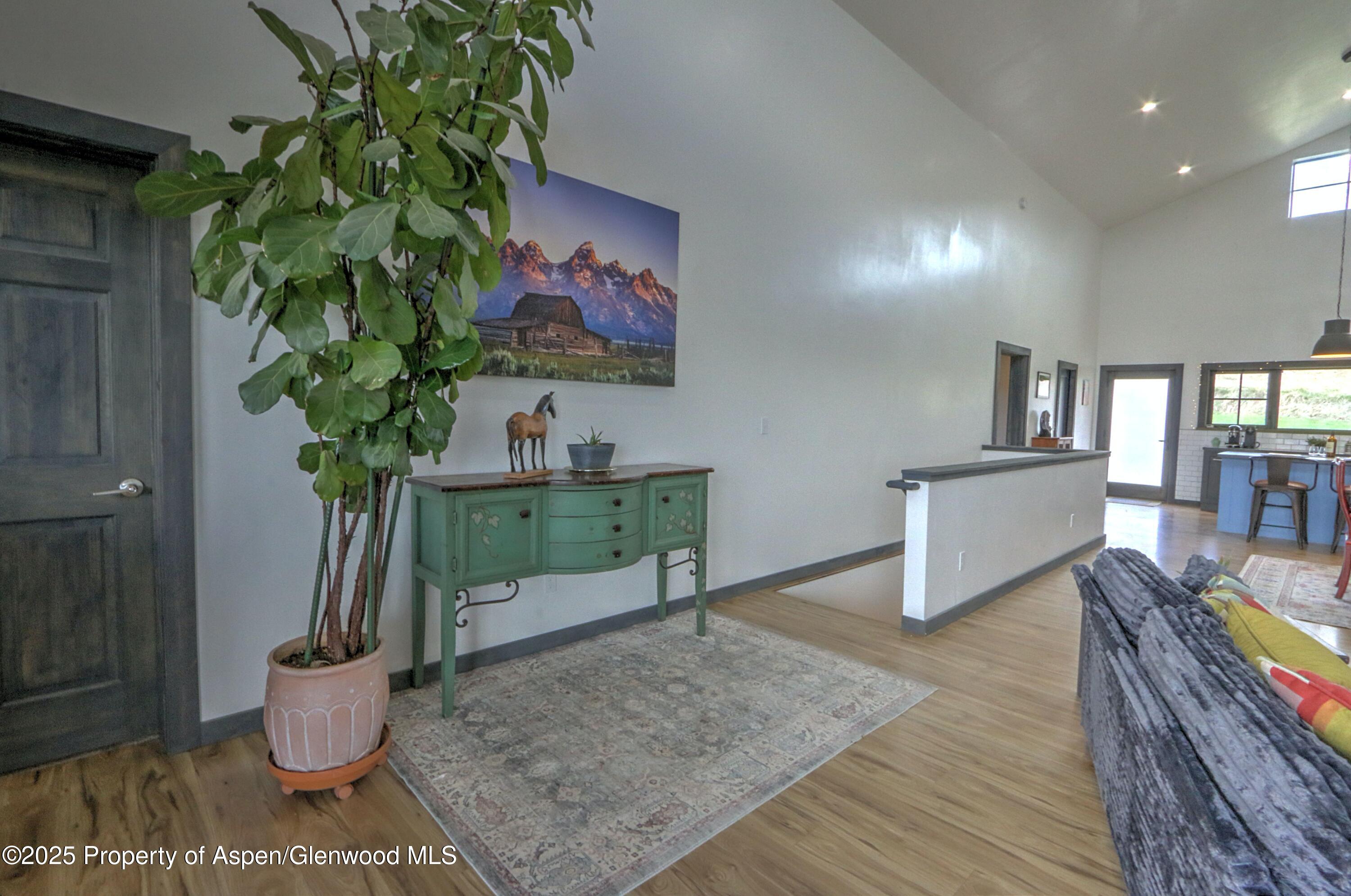 7315 County Road 312 New Castle, CO 81647 - Photo 28 of 75 a living room with furniture and a potted plant
