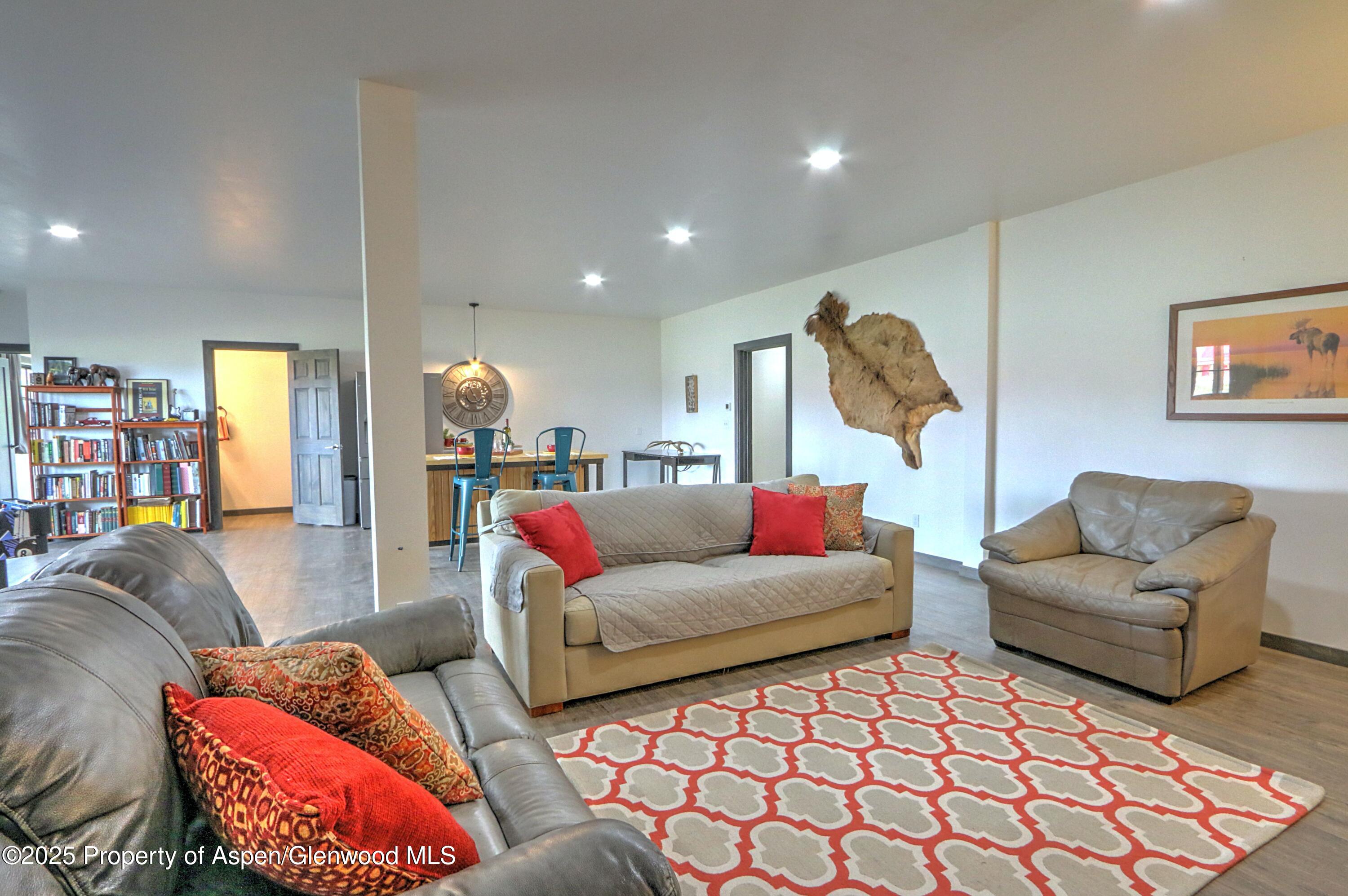 7315 County Road 312 New Castle, CO 81647 - Photo 30 of 75 a living room with furniture and a large window
