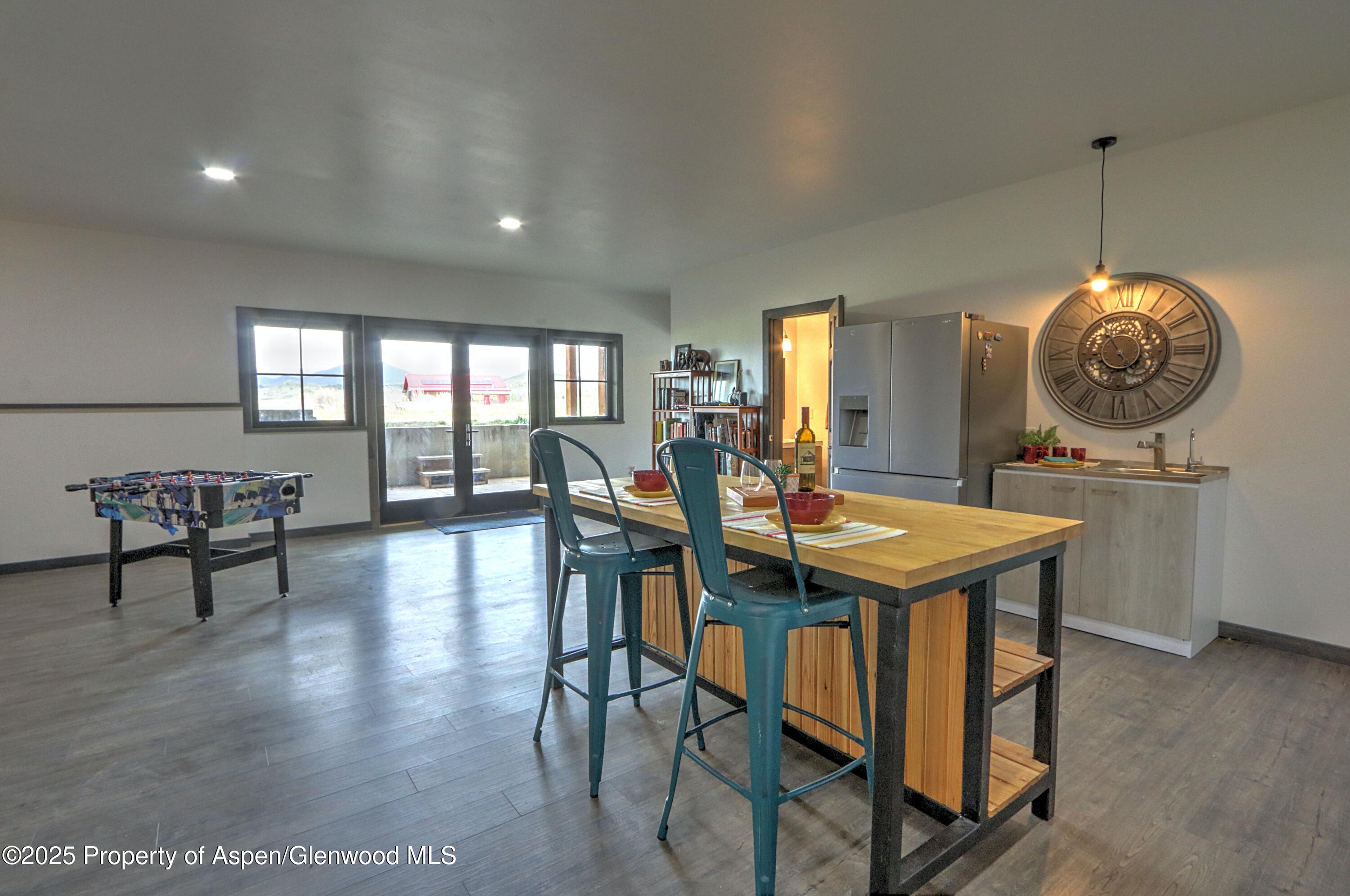 7315 County Road 312 New Castle, CO 81647 - Photo 32 of 75 a view of a dining room with furniture and wooden floor