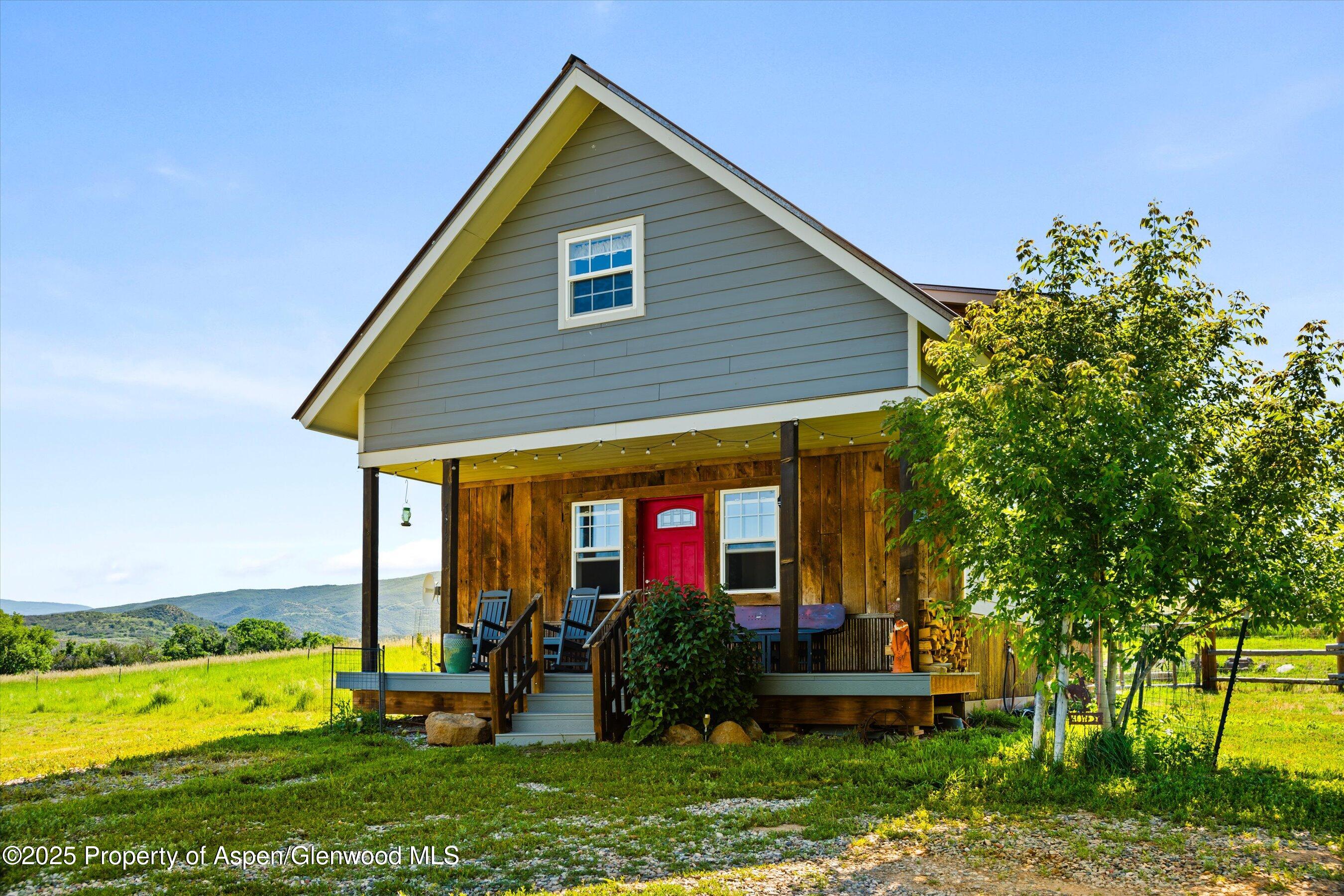 7315 County Road 312 New Castle, CO 81647 - Photo 44 of 75 a front view of house with garden