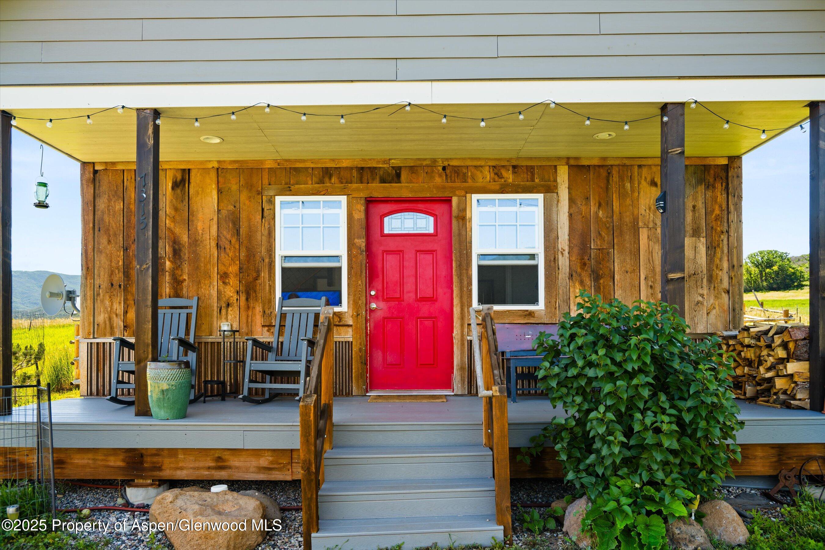 7315 County Road 312 New Castle, CO 81647 - Photo 45 of 75 a view of front door of house with outdoor seating