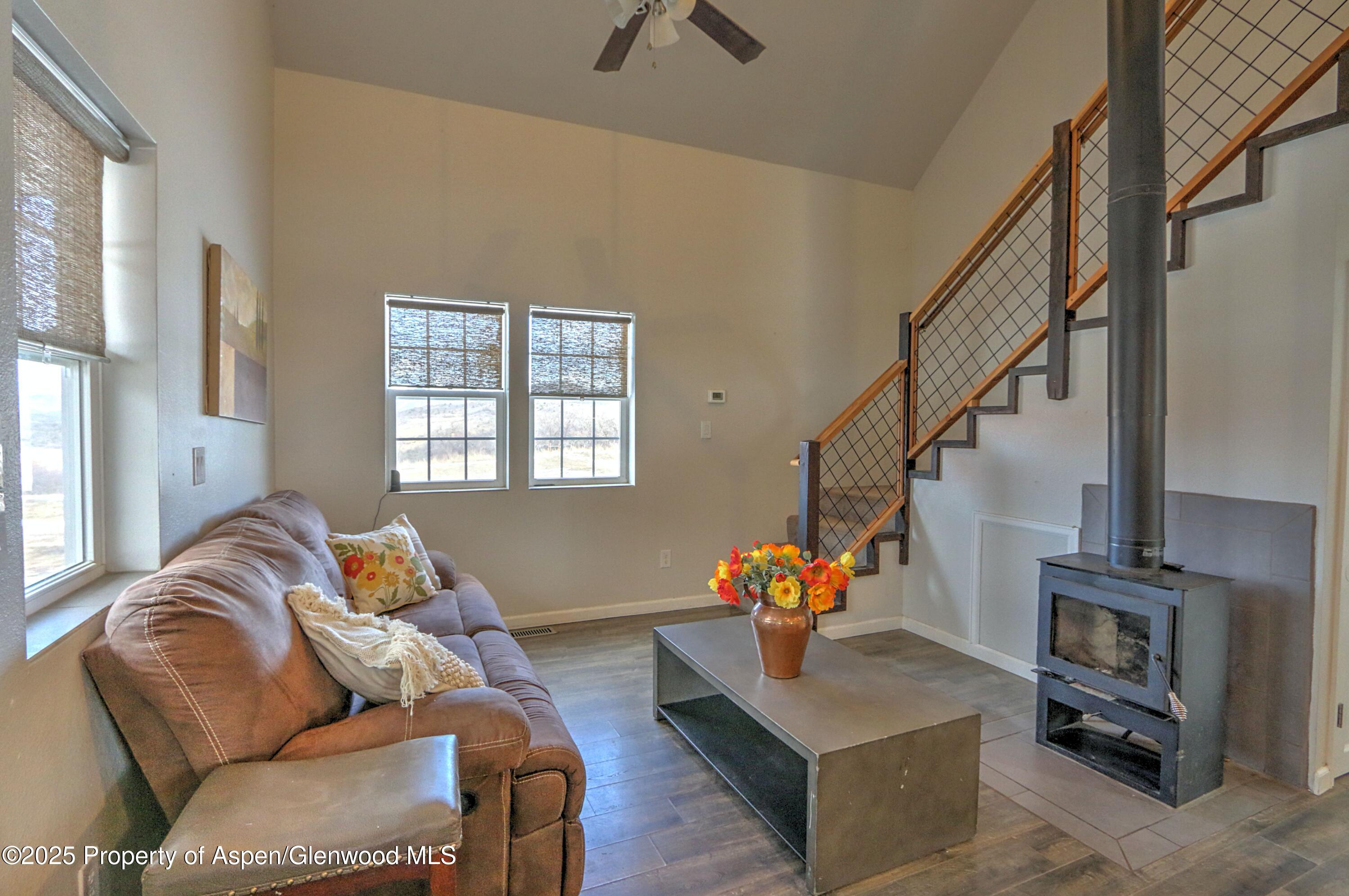 7315 County Road 312 New Castle, CO 81647 - Photo 50 of 75 a living room with furniture and stairs