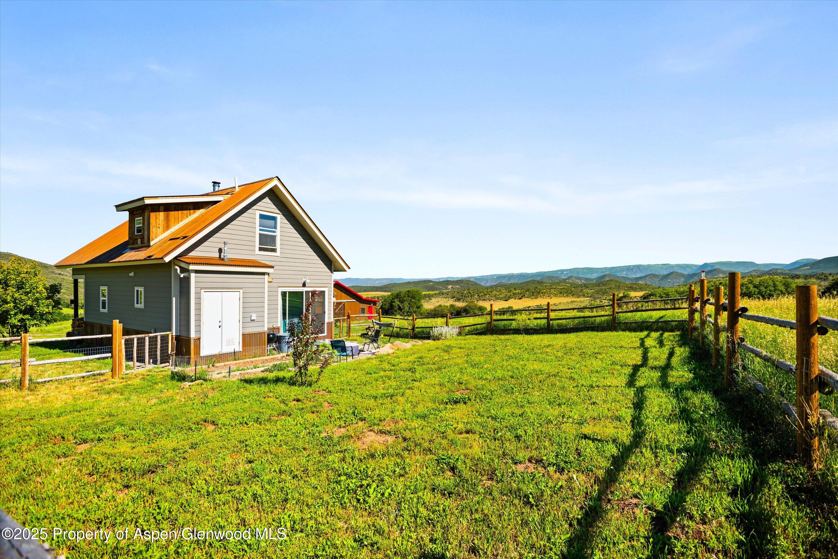 7315 County Road 312 New Castle, CO 81647 - Photo 58 of 75 a view of a house with pool and chairs