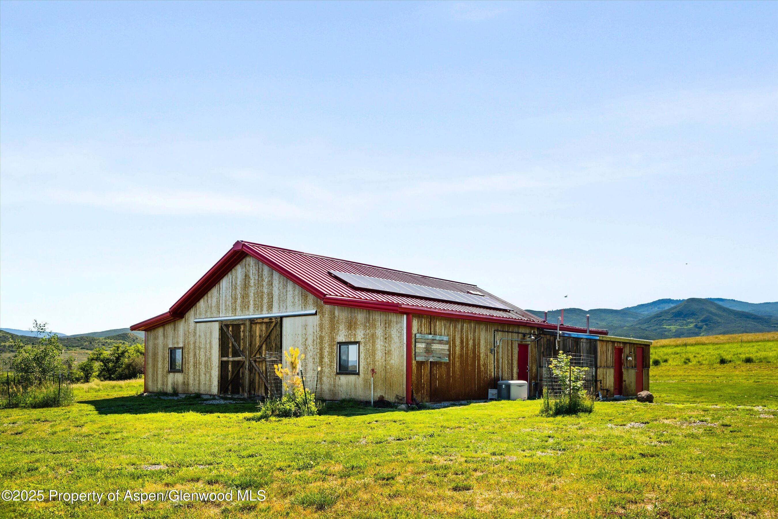 7315 County Road 312 New Castle, CO 81647 - Photo 60 of 75 a view of front of house with a big yard