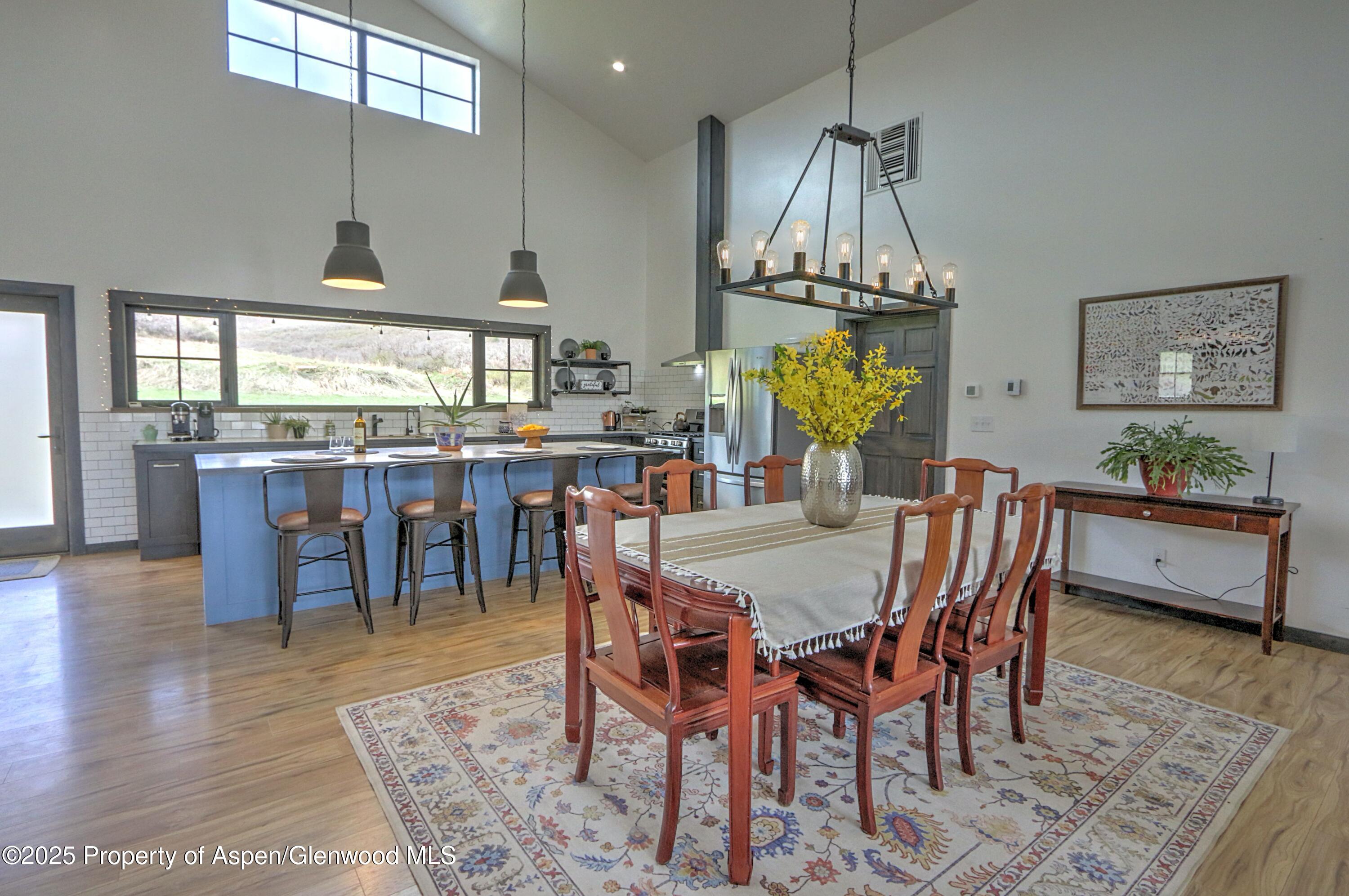 7315 County Road 312 New Castle, CO 81647 - Photo 6 of 75 a view of a dining room with furniture window and wooden floor