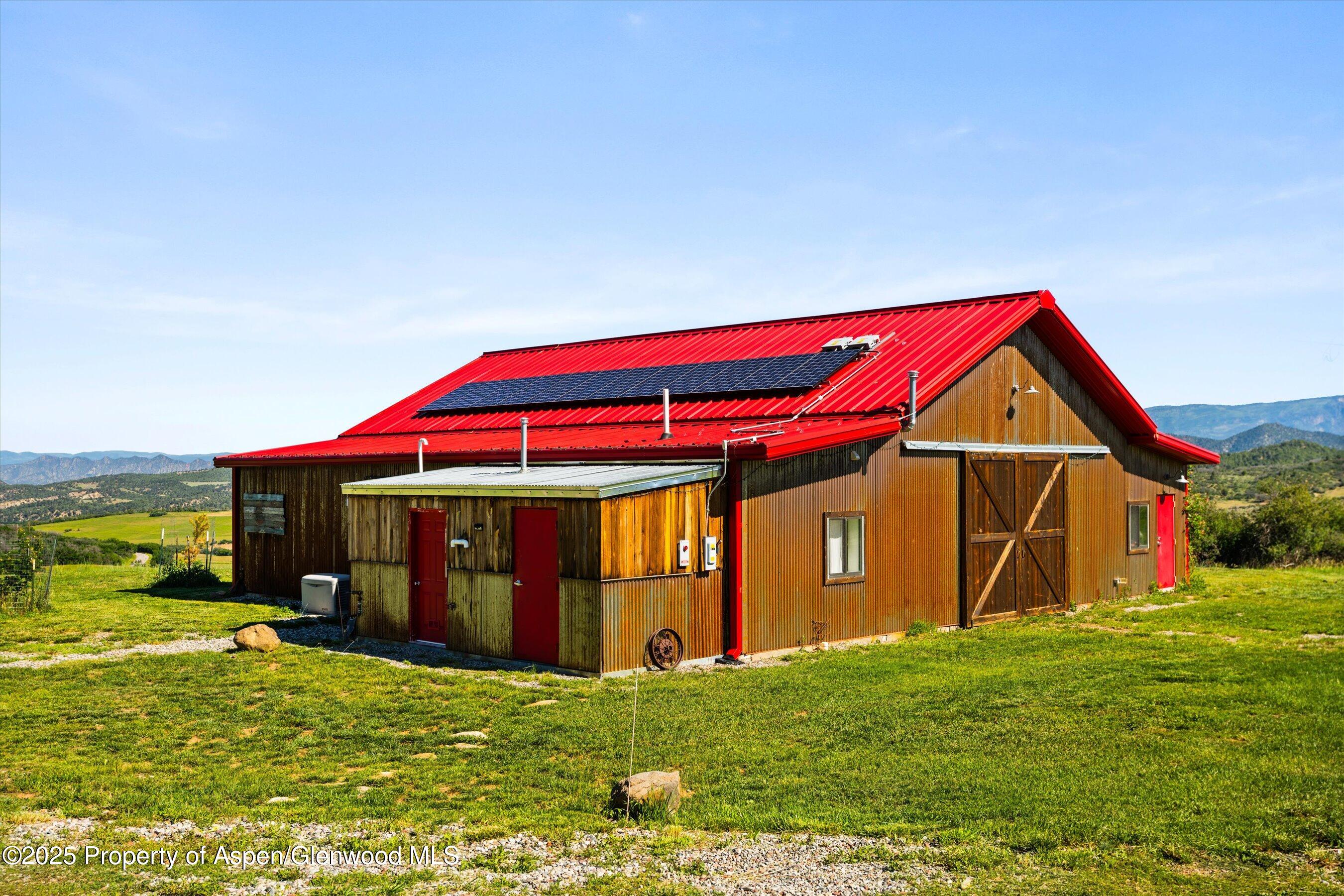 7315 County Road 312 New Castle, CO 81647 - Photo 62 of 75 a house view with a garden space